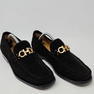 Salvatore Ferragamo Black and Gold Loafers with Luxurious Design